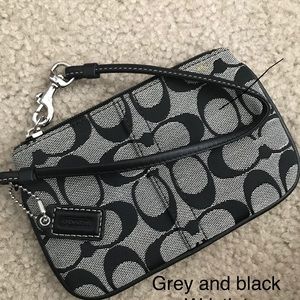 Coach grey and black wristlet. New without tags
